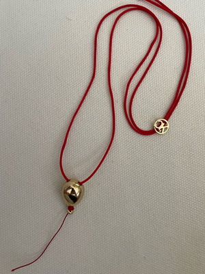 Kessaris necklace used with gold-plated balloon-shaped pendant