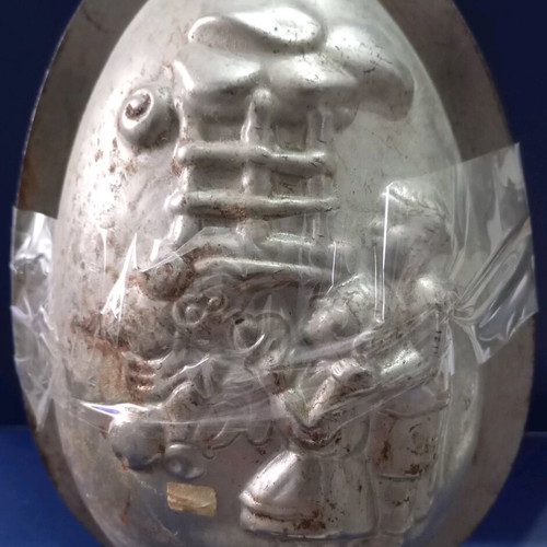 Easter mold used for chocolate egg with children and gifts design