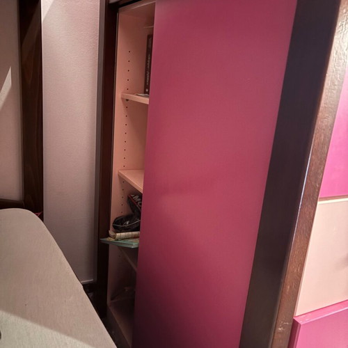 Loft bed used with storage cabinets and hidden desk