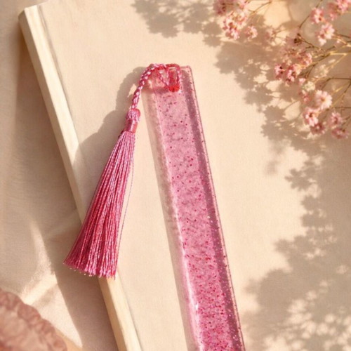 Handmade pink resin bookmark with glitter and tassel