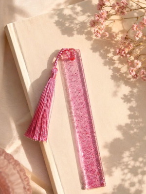 Handmade pink resin bookmark with glitter and tassel