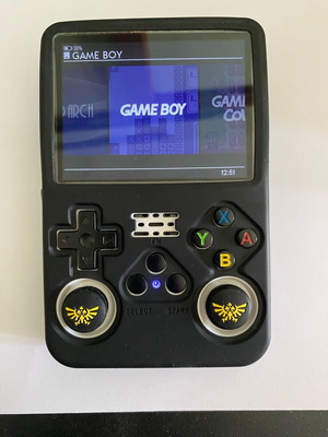 R36S handheld console with Dark OS, silicone case and screen protector, like new