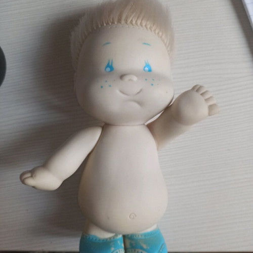 Plastic vintage doll used, collectible with hair