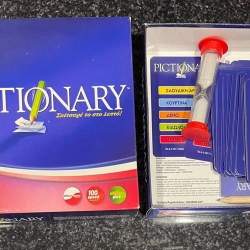 Pictionary travel board game almost unused