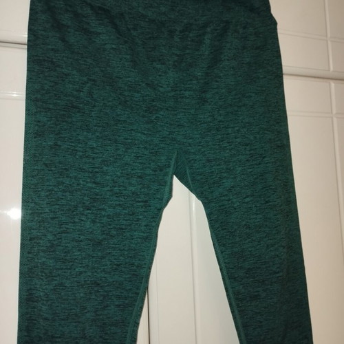 Athletic leggings used seamless in dark green heather color