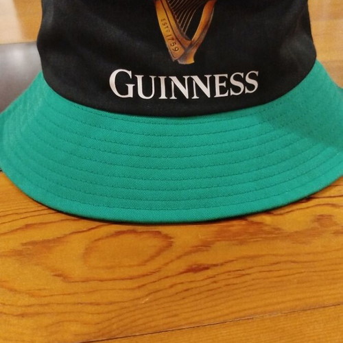 Guinness Bucket Hat new, black with green brim, one size