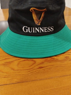 Guinness Bucket Hat new, black with green brim, one size