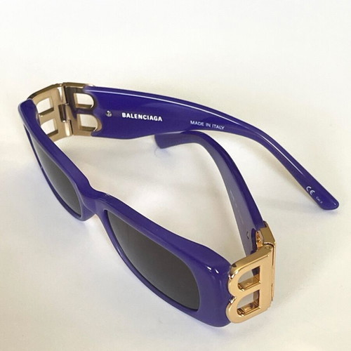 Balenciaga sunglasses purple like new with gold BB logo and silver case