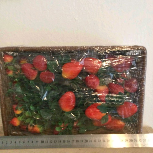 Basket with artificial fruits like new