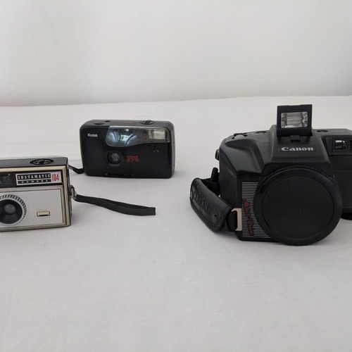 Three vintage cameras used Canon Kodak Instamatic STAR275