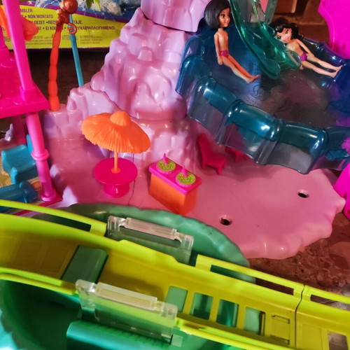 Polly Pocket Spin'n Surprise Waterpark playset used with 3 dolls and accessories