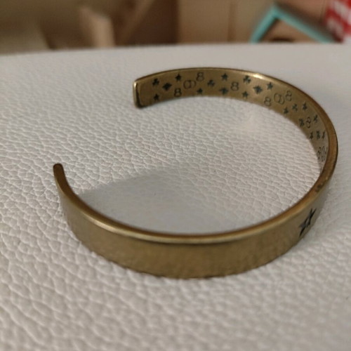 Christian Dior brass cuff bracelet like new, gold tone
