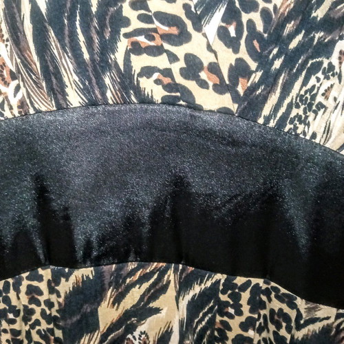 Animal print dress new with 3/4 sleeve and satin belt size medium/large
