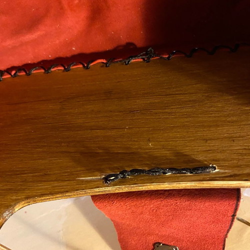 Wooden handmade bag with red leather stitched by hand