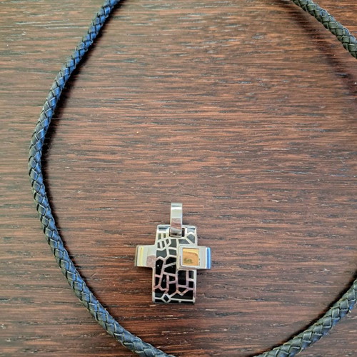 Impressive cross used with leather cord