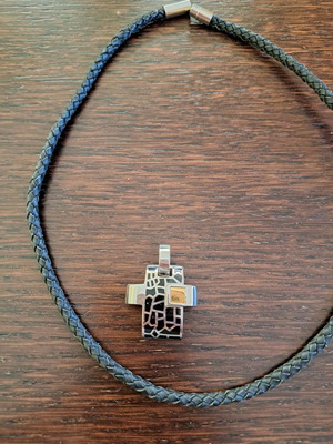 Impressive cross used with leather cord