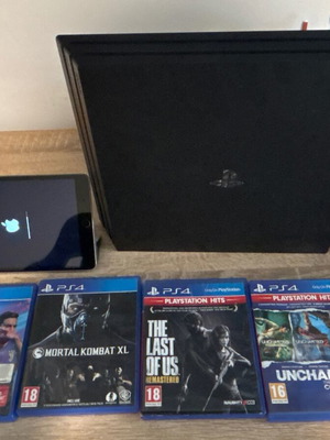 PS4 Pro like new with iPad mini 3, games and controller