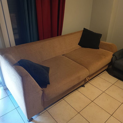 Three-seater sofa with storage space