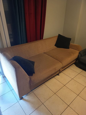 Three-seater sofa with storage space
