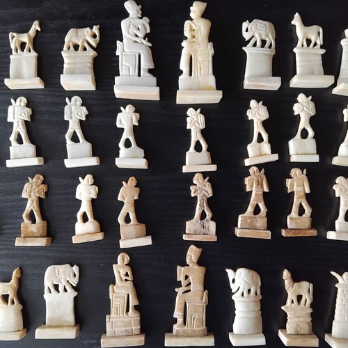 Handmade chess with mother-of-pearl and ancient Egyptian figures used