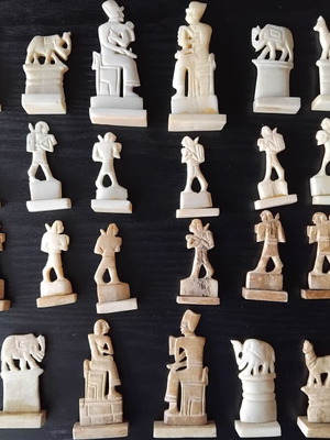 Handmade chess with mother-of-pearl and ancient Egyptian figures used