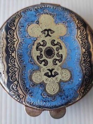 Powder compact used Made Italy with metal case and soft cover