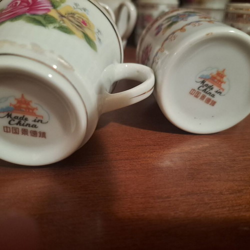 Porcelain coffee cups new with saucers and bowls