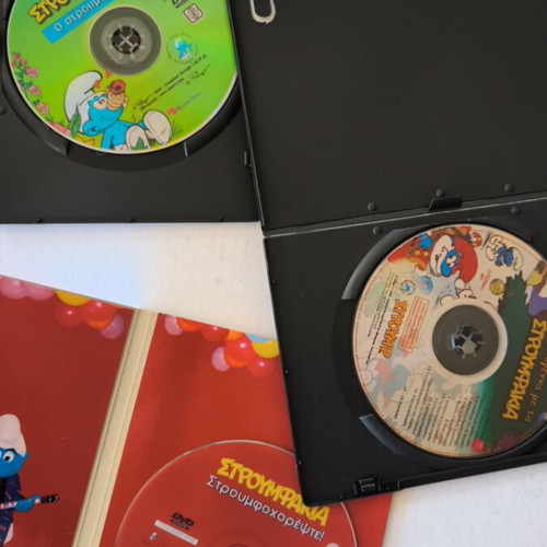 Smurfs 2 DVDs and 1 CD like new, dubbed animated
