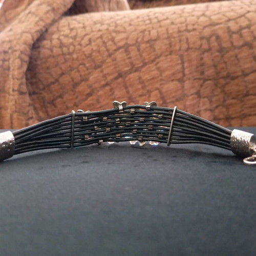 Leather women's bracelet with decorative hearts and rhinestones like new