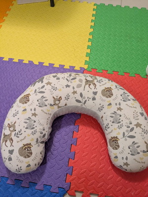 Feeding pillow used with minor seam tear, functional