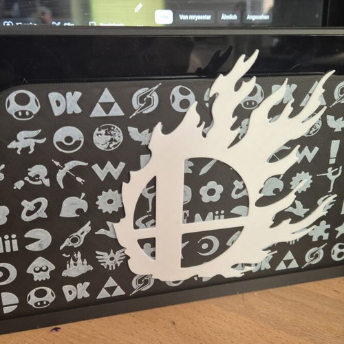 Nintendo Switch 2 3D printed dock cover with Super Smash Bros design