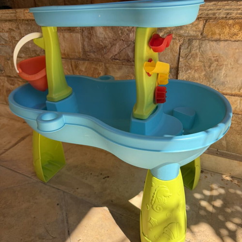 Sand and water activity table with accessories
