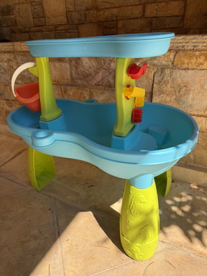 Sand and water activity table with accessories