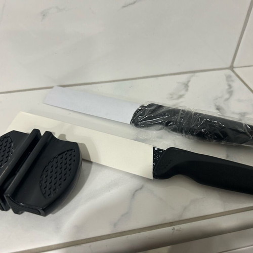 Set of 2 new Swiss knives with sharpener