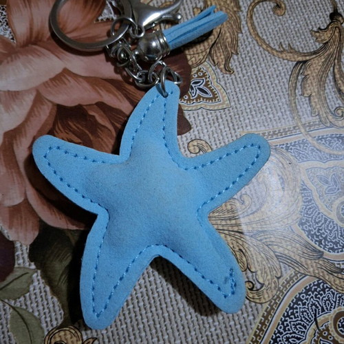 Starfish keychain like new, blue with rhinestones