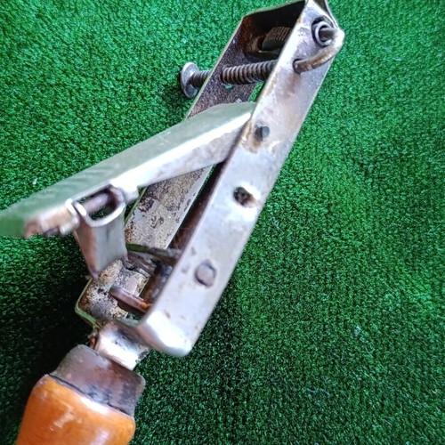 Vintage mechanical flint gas lighter with wooden handle