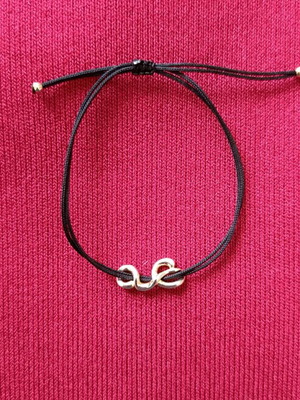 Bracelet with silver and waxed cord like new, gold-colored