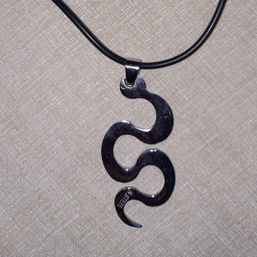 Pendant stainless steel snake with rubber cord like new, black and silver