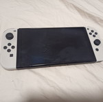 Nintendo Switch with three games