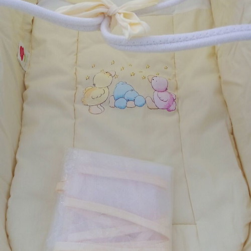 Motherbaby yellow bassinet like new with accessories and anatomical mattress