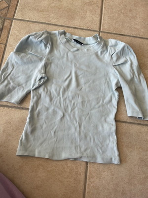 Pink Woman blue shirt size S used with defect
