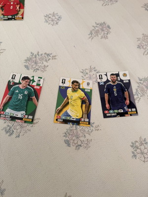 World Cup football cards numbers 290, 74, 411 featuring Danilo, Grant Hanley, Israel Reyes