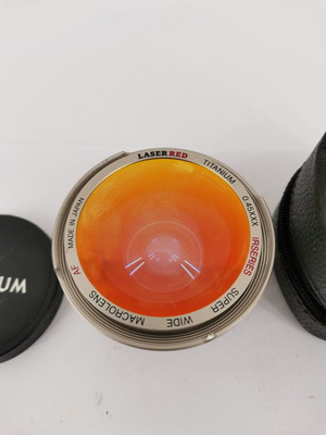 Titanium Laserred camera lens used with case