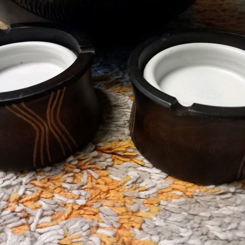 Wooden large bowl used with two ashtrays and a tray