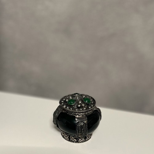 Vintage silver-plated decorative box with green glass and stones