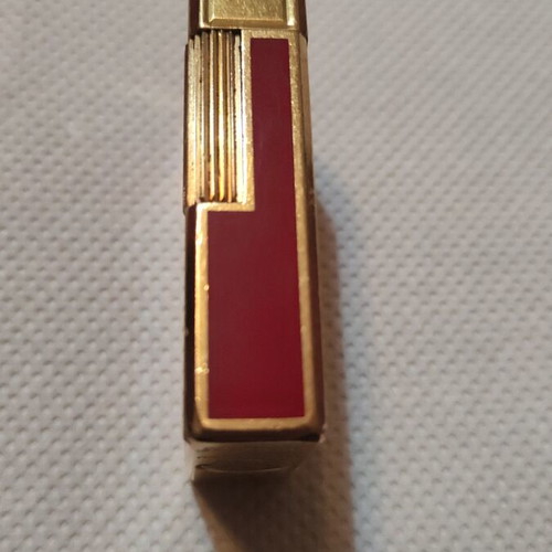 S.T.Dupont lighter like new, gold and red, refillable gas