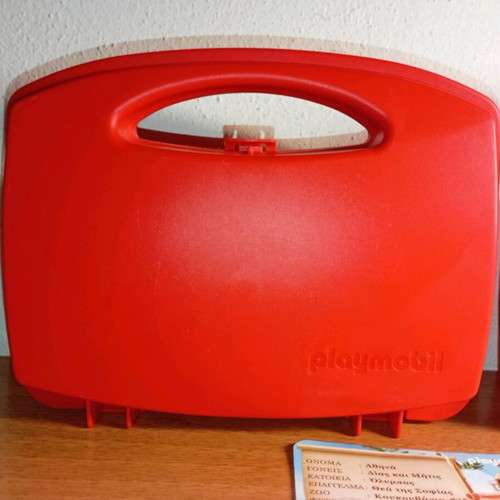 Playmobil cases used with cards and brochures