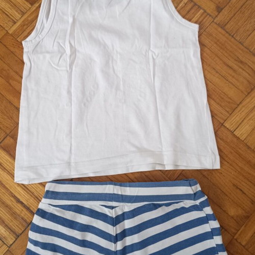 New College girls' set with striped skort and sequin bow top, used, size 6