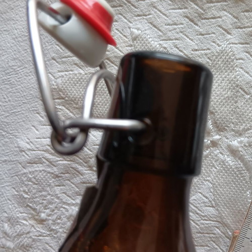 Collectible beer bottle with safety cap like new