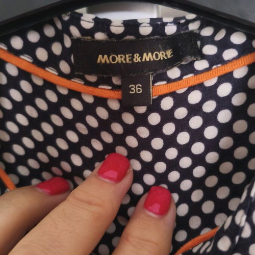 More women's long-sleeve shirt used, black with white dots, size S